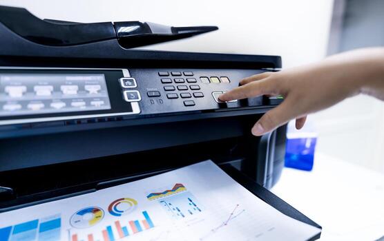 office-worker-print-paper-on-multifunction-laser-printer-copy-print-scan-and-fax-machine-in-office-modern-print-technologycopy-machine-document-and-paper-work-professional-scanner-photo